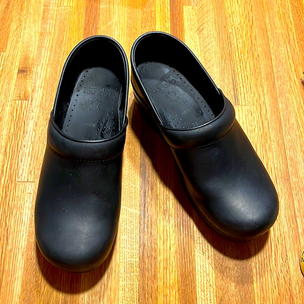 Dansko black leather clogs